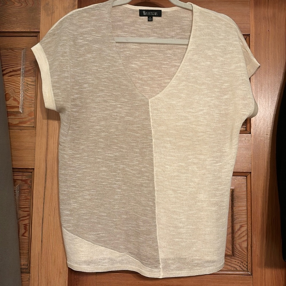 Taupe and cream very light sweater material.